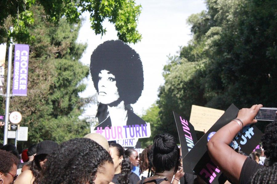 Activists+gather+with+signs+at+Crocker+Park+on+O+Street+in+downtown+Sacramento+before+the+start+of+the+Black+Womens+March+on+Saturday+June+9%2C+2018.This+is+the+second+annual+Black+Womens+March+hosted+by+Black+Women+United.
