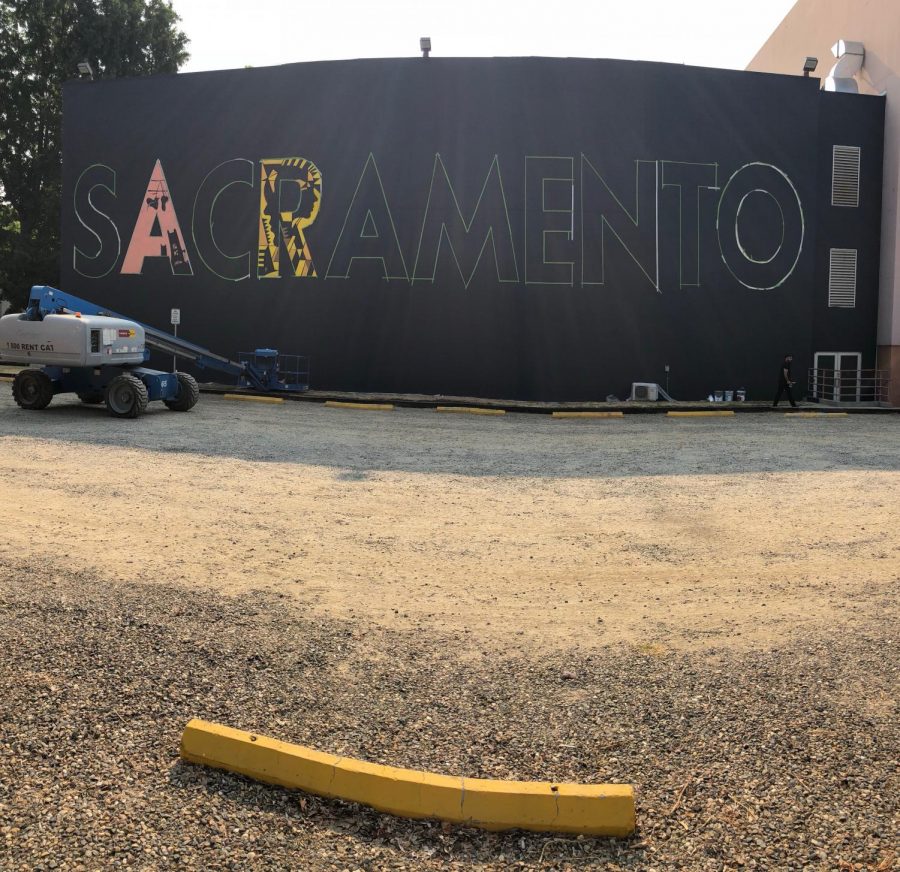 Raphael+Delgado+and+nine+other+artists+are+completing+this+SACRAMENTO+mural+on+the+side+of+Shasta+Hall+as+part+of+the+Wide+Open+Walls+art+festival+that+is+being+held+from+Aug.+9-19.