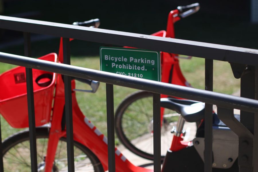 Not one but two Jump Bikes were parked in front of the Sacramento State University Library in an area that bicycle parking is prohibited. Sac State updated its wheeled device policy to account for the introduction of electric scooters in Sacramento on Tuesday.