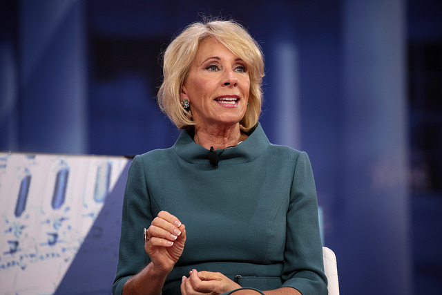 Secretary+of+Education+Betsy+DeVos+at+the+2018+Conservative+Political+Action+Conference+in+National+Harbor%2C+Maryland.+DeVos+is+possibly+rescinding+policies+put+in+place+by+the+Obama+administration+to+require+a+higher+amount+of+evidence+to+be+provided+in+order+to+prove+that+sexual+misconduct+occurred.+