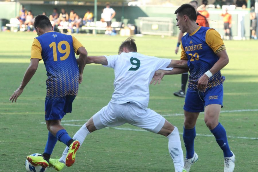 Sacramento State Hornet forward Benji Kikanovic tries to regain the ball he lost from San Jose State University defender Andrew Mendoza. The Hornets lost their first home match against San Jose State 2-1 on Sunday. 