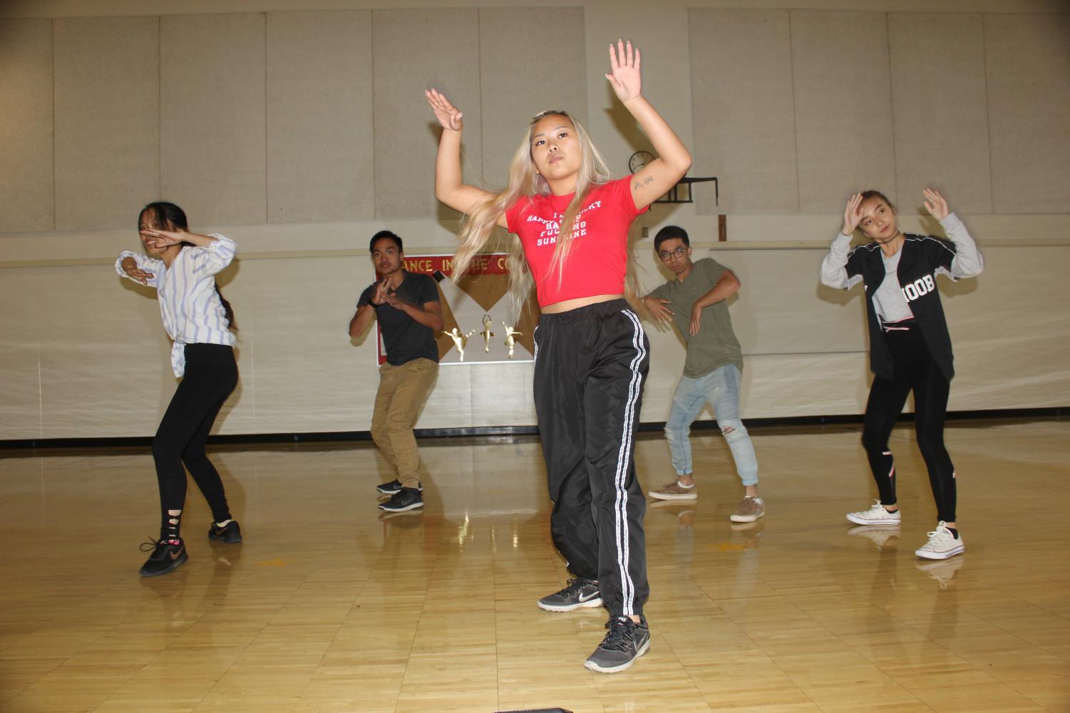 From left to right, Kristina Yang, Mark Joseph Abuda, Melissa Lee, Anthony Bernardez and Joyce Vang running their winning dance set they performed at the SacAnime K-pop battles on Sept. 1, 2018.