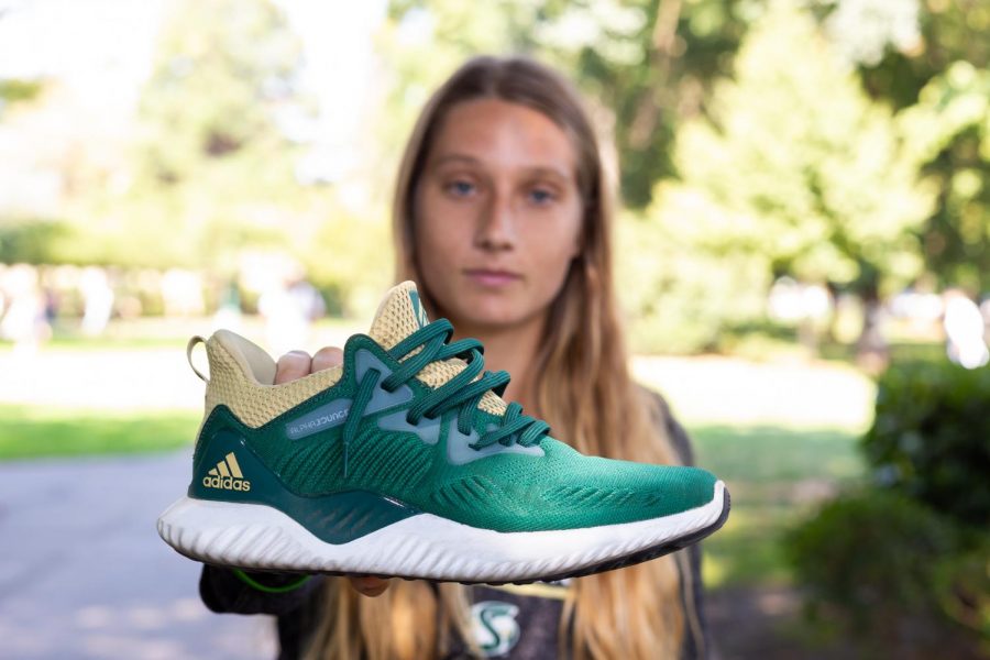 Sacramento State sophomore, Shay Valenzano, holds her custom Adidas Alphabounce on Friday, Aug. 31.