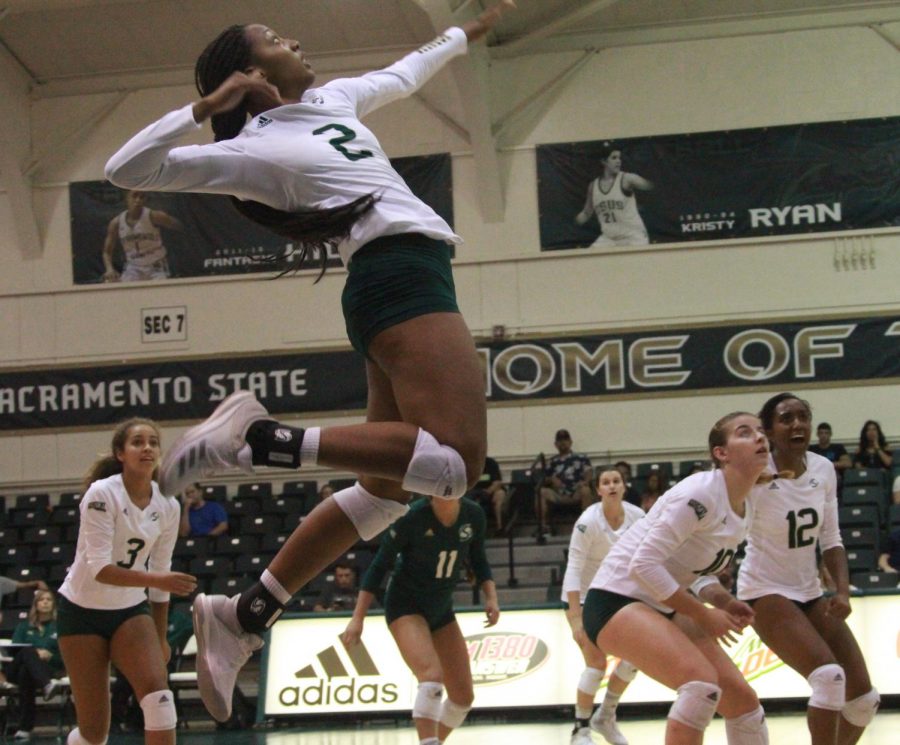 Sac State sophomore outside hitter Cianna Andrews anticipates striking the ball against the University of Nevada on Sept. 8.