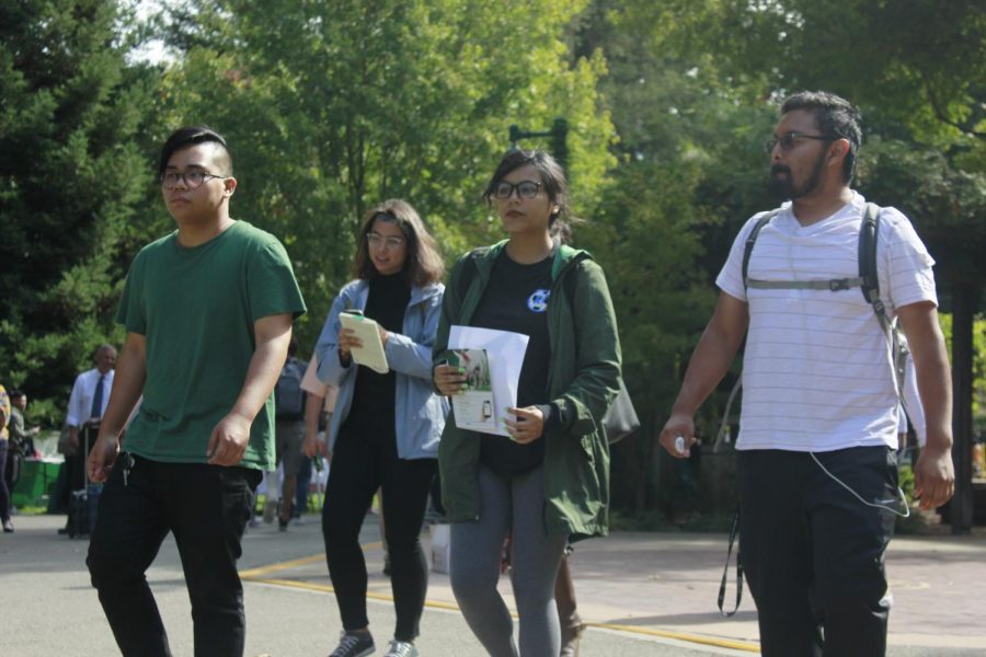 Deion Seruelo, left, a student only identified as Alyssa, middle, and a student only identified as Alex, right, lead a group of demonstrators to the office of Sacramento State President Robert Nelsen Thursday. The students from multiple campus organizations delivered a list of demands stemming from what considered an under reported sexual assault at American River Courtyard.