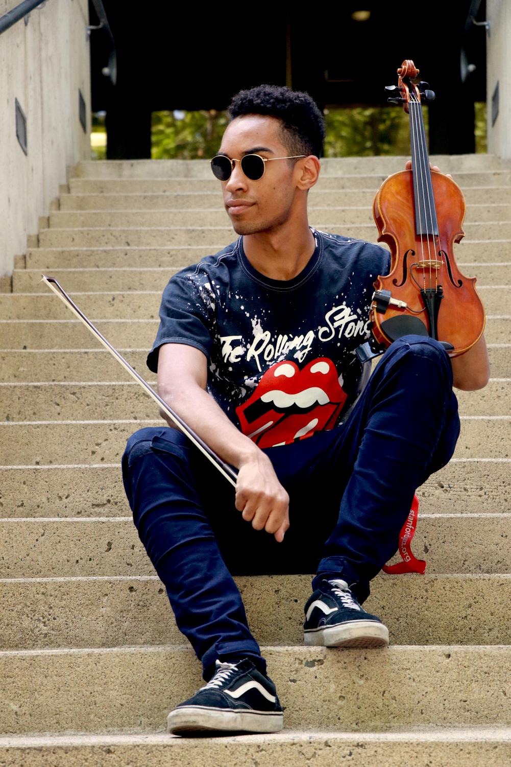 Matthew Major poses for a portrait photo on the steps of Eureka Hall on Friday, Sep. 14, 2018.