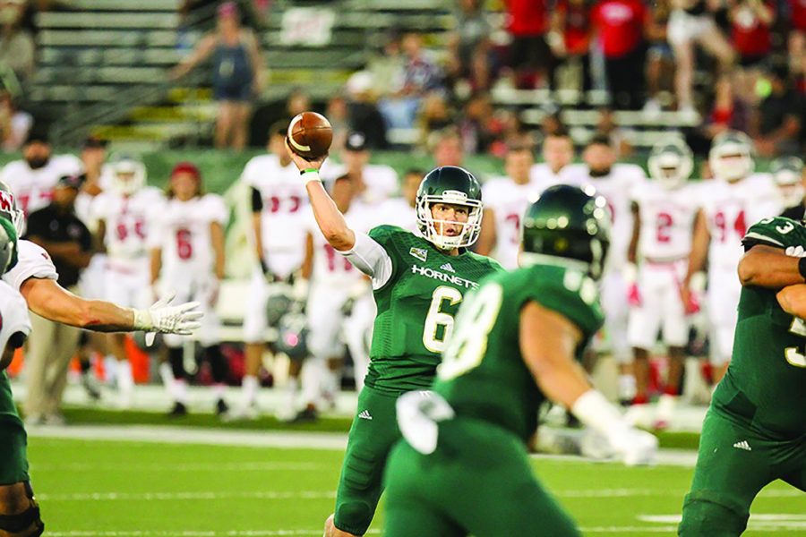 Sophomore Nate Ketteringham throws the ball against Western Oregon, Sept. 3, 2016. Ketteringham is one of many football players that transferred from Sac State soon after Jody Sears took over as head coach.