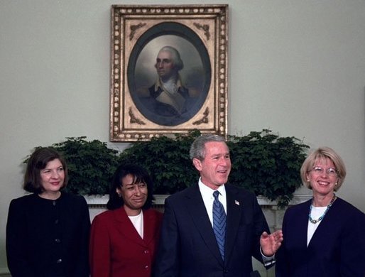 Then-President George W. Bush introduces his judicial nominees Justice Priscilla Owen, left, Justice Janice Rogers Brown, center, and Judge Carolyn Kuhl in the Oval Office Thursday, Nov. 13, 2003. Brown is being considered by President Donald Trump to replace Jeff Sessions as Attorney General, who quit Wednesday morning.