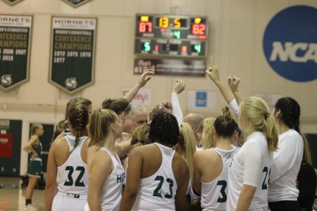The Hornets huddle and go over defensive schemes with 13.5 seconds left and a 87-82 lead against Cal Poly Nov. 11.