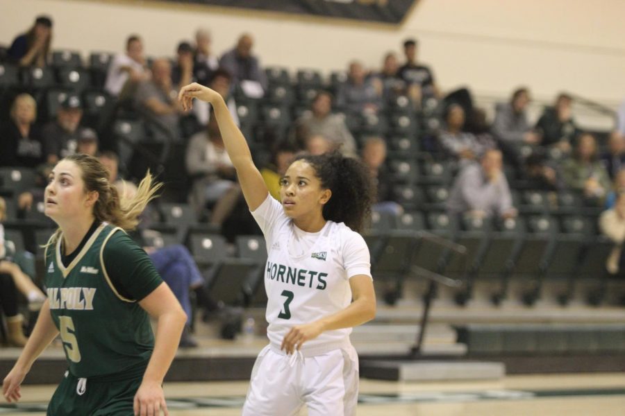 Sac+State+junior+guard+Tiara+Scott+watches+as+her+3-pointer+goes+in+to+give+her+team+a+87-82+lead+with+13.5+seconds+left+in+the+game+against+Cal+Poly+on+Nov.+11+at+the+Nest.+The+Hornets+beat+the+Mustangs+in+the+season+opener+88-85.