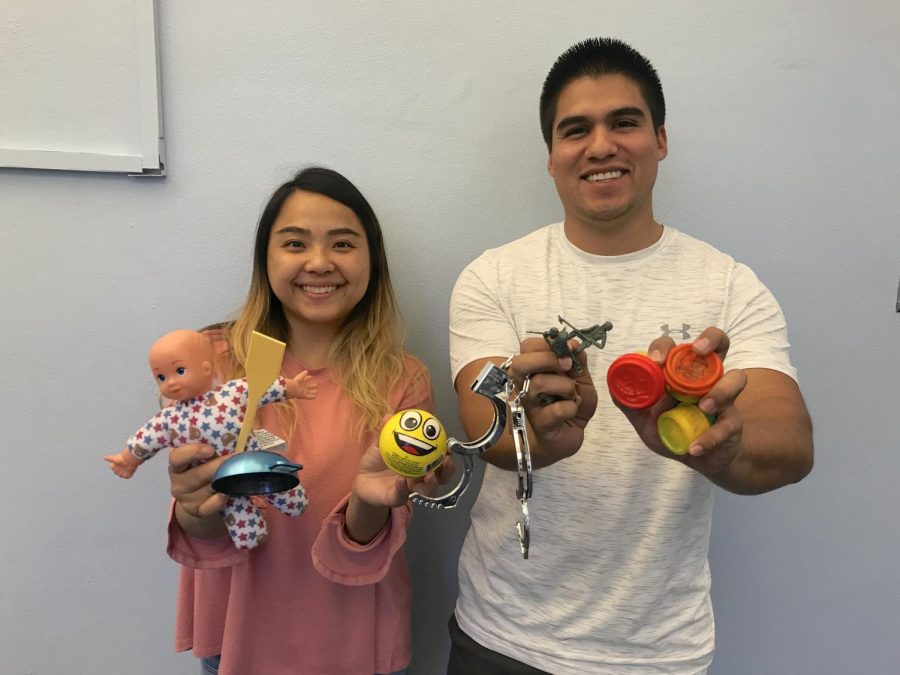 Bao+Vang+%28left%29+and+Humberto+Ramirez+%28right%29+are+graduate+students+in+the+counseling+program+at+Sac+State+learning+how+to+apply+play+therapy+with+children.+
