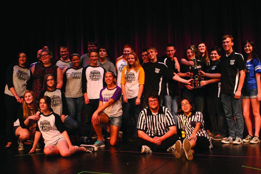 This is me, sitting in stripes toward center, after a full day of hosting ComedySportz matches for High School League teams. This day, and many others in the last six years, will be ingrained in my memory forever for how fun, uplifting and inspiring it was. I would forget the haircut if I could.
