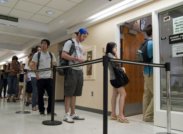 Sac State students wait in line for the bursars office at Lassen Hall in 2010. Anita Kermes, financial aid director, has promised support for students unable to finish filling out their financial aid applications for the Spring 2019 semester due to a government shutdown. 