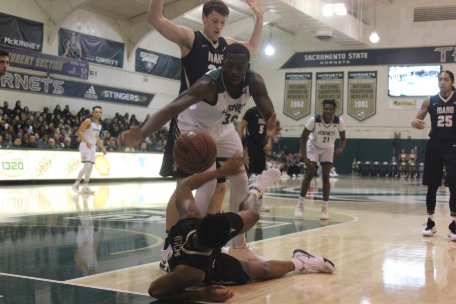 Sac State junior center Joshua Patton dives for the ball during the Hornets 69-48 win over the University of Idaho on Thursday. Patton finished the game with 13 points and 8 rebounds.