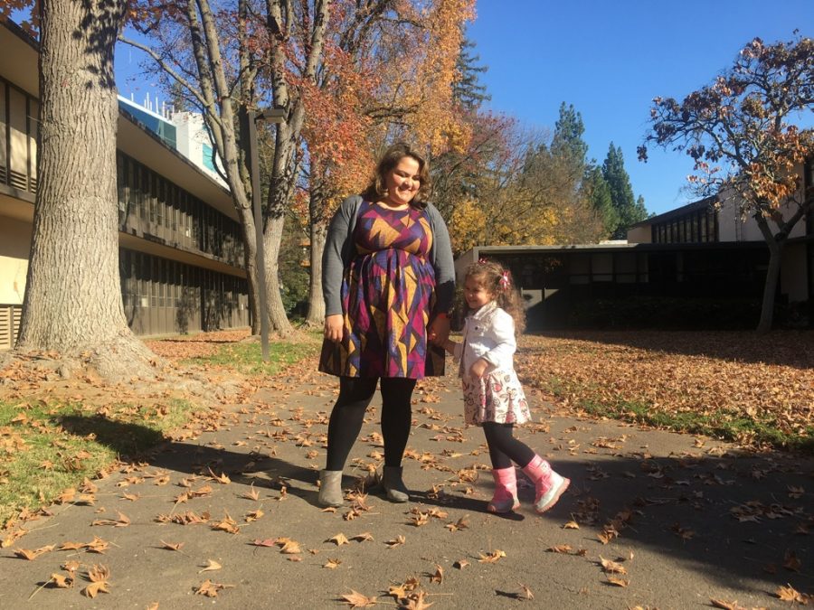Business administration major Rosa Garcia and her daughter outside of Alpine Hall at Sacramento State Saturday, Dec. 8. Garcia is one of the more than 10 percent of students at Sac State who are juggling being a parent and a student — on top of many other roles.