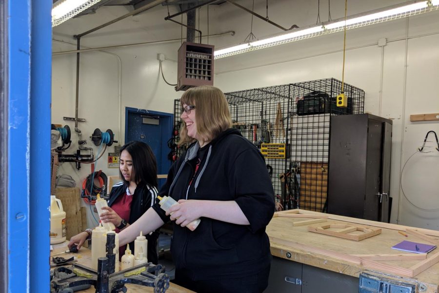 From left, senior art majors Carmen Tham and Heather Schepperle work on their art pieces in the Art Sculpture Lab located on campus next to the Sacramento State Police Department on Wednesday. The Art Sculpture Lab is one of two art buildings with outstanding issues in refurbishments. 