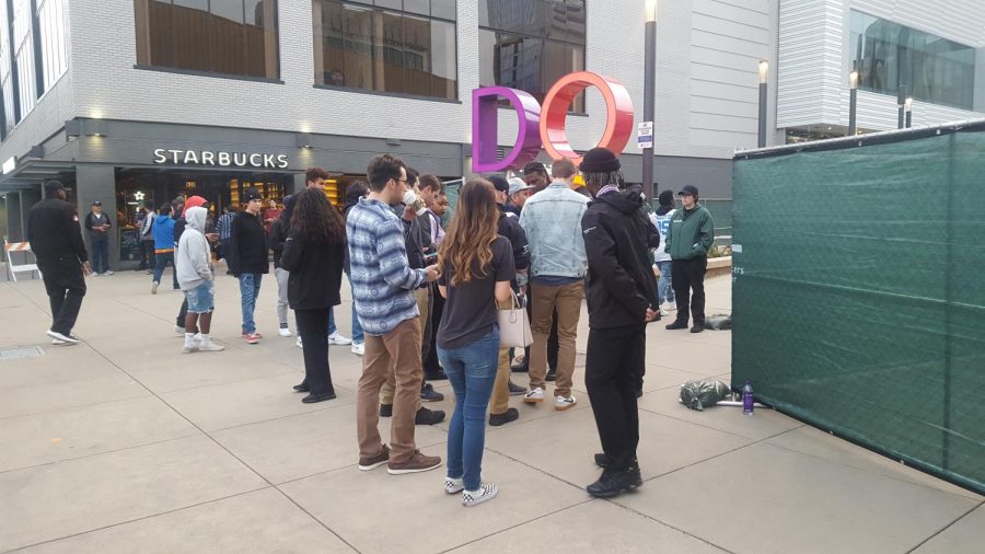 Fans wait at the temporarily barricaded entrance of the Downtown Commons prior to the Sacramento Kings versus New York Knicks game Monday. The Kings released a statement earlier in the day that only ticketed fans would be allowed beyond the barricade in order to ensure entry into the arena.