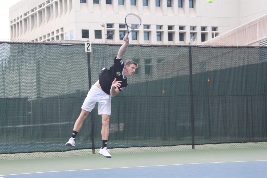 Senior Sac State mens tennis player Mikus Losbergs, swings against Nevada. Losbergs has a record of 4-4 this season. 