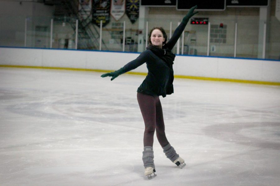 Sac State graduate student Samantha Mapes skates at Skatetown Ice Arena in Roseville. Mapes, who was in Disney on Ice for three years, shows off one of her favorite moves.