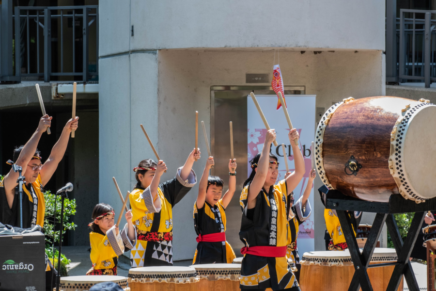 The+Koyasan+Spirit+of+Children+Taiko+Group+strike+taikos+in+unison+during+a+performance+for+Sac+States+Japan+Day.+Each+taiko+is+unique+and+custom-made+from+sanded+wine+barrels.