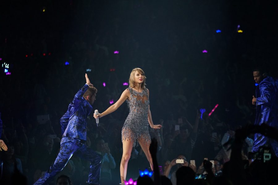 Taylor Swift performs in Shanghai in 2015 as part of her 1989 World Tour. Swifts latest single, Me! features Brendon Urie of Panic! at the Disco.