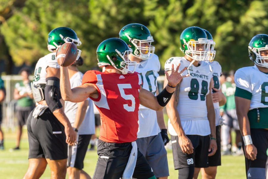 Sac State junior quarterback Kevin Thomson throws a pass during training camp on Tuesday, August 12 at the practice field. Thomson, who was a senior in 2018, was granted two additional years of collegiate eligibility by the NCAA during the offseason.