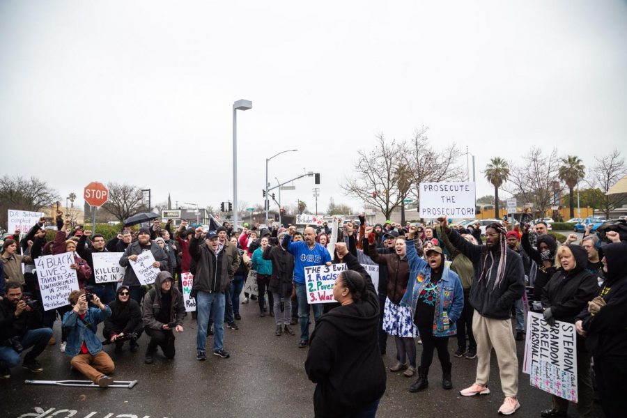 Protestors outside of the Sacramento Police department in March demanded responsibility from the Sac PD for the officers who shot Stephon Clark a year prior. Clark’s children were awarded a $2.4 million settlement from the city on Wednesday. 