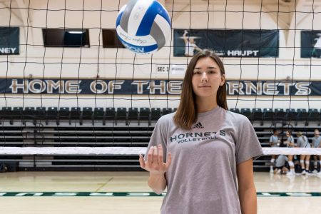 Senior outside hitter Sarah Davis poses for a photo before practice on Monday, Sept. 23 at The Nest. Davis is the co-captain and lone senior on a young Sac State volleyball team.