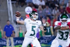 Sac State junior quarterback Kevin Thomson throws a pass against Fresno State on Saturday, Sept. 21 at Bulldog Stadium. The Bulldogs defeated the Hornets 34-20.