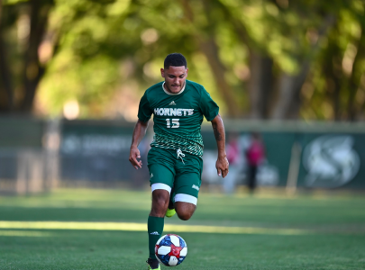 Sac State sophomore forward Arath Chavez dribbles the ball up field against Army on Friday, Sept. 6 at Hornet field. Chavez scored one goal to help lead his team to the 2-0 win.