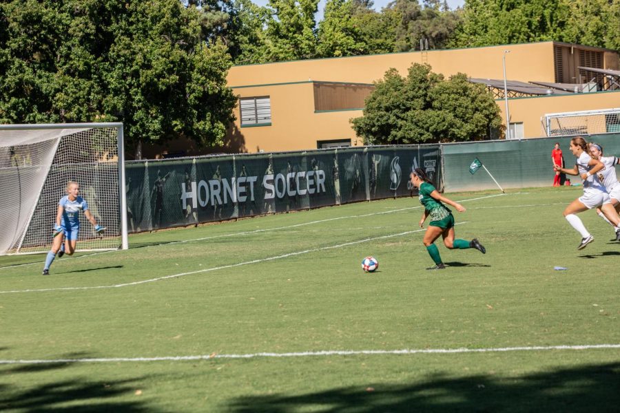 Sac State junior forward Kylee Kim-Bustillos prepares to shoot a goal against Toledo on Sunday, Sept. 15 at Hornet Field. Kim-Bustillos scored in the 81st minute to give her team the go-ahead goal.