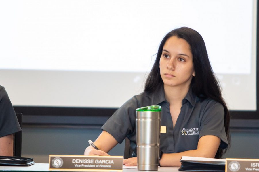 Sac+State+student%2C+Denisse+Garcia%2C+ASI+Vice+President+of+Finance%2C+takes+notes+during+an+ASI+meeting+Wednesday%2C+Oct.+4.+Garcia+is+a+DACA+recipient+who+is+currently+studying+business.