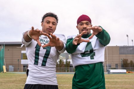 Sacramento State wide receivers sophomore Dewey Cotton and junior Isaiah Gable pose for a photo Wednesday, Oct. 16 at the practice field. Gable and Cotton both come in at 5-feet-4-inches tall on the team roster, eight inches shorter than the average height for college receivers.