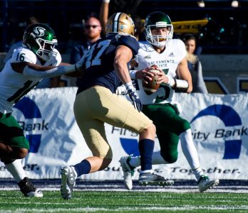Sac State junior quarterback Kevin Thomson evades Montana State University linebacker Callahan OReilly Saturday, Oct. 12 at Bobcat Stadium.  The Hornets defeated the Bobcats 34-21, earning their first road win of the season.