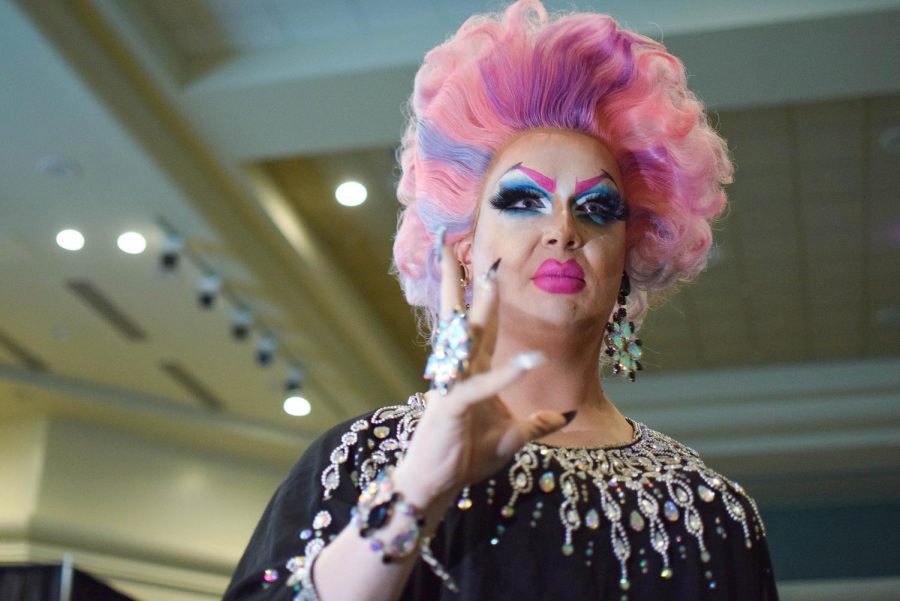 Coco Bechamel performs in the University Union Ballroom Wednesday, Oct. 16. They wore a sparkly dress and flashy jewelry for the performance.