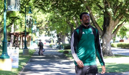 Sac State mens basketball team captain Joshua Patton takes a morning walk through campus Wednesday Oct. 2. His teammates and coaches call him an old soul for his hobby.