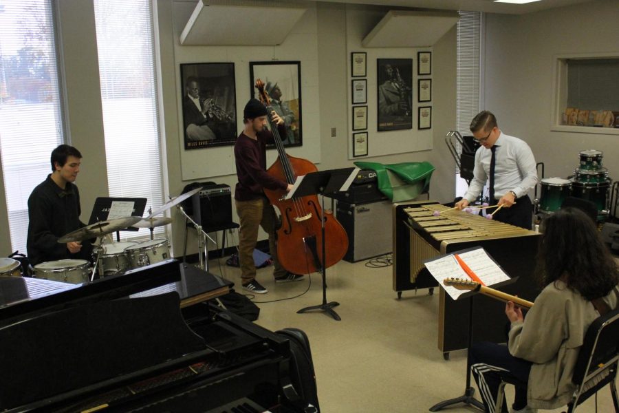 Jazz studies students Zach Martin on guitar, Gabe Carpenter on drums, Tyler Miles on bass and lecturer Tristan Rogers on vibraphone rehearse for the upcoming Jazz Combo concert. Jazz Combos are bands made up of Sac State student and alumni musicians.