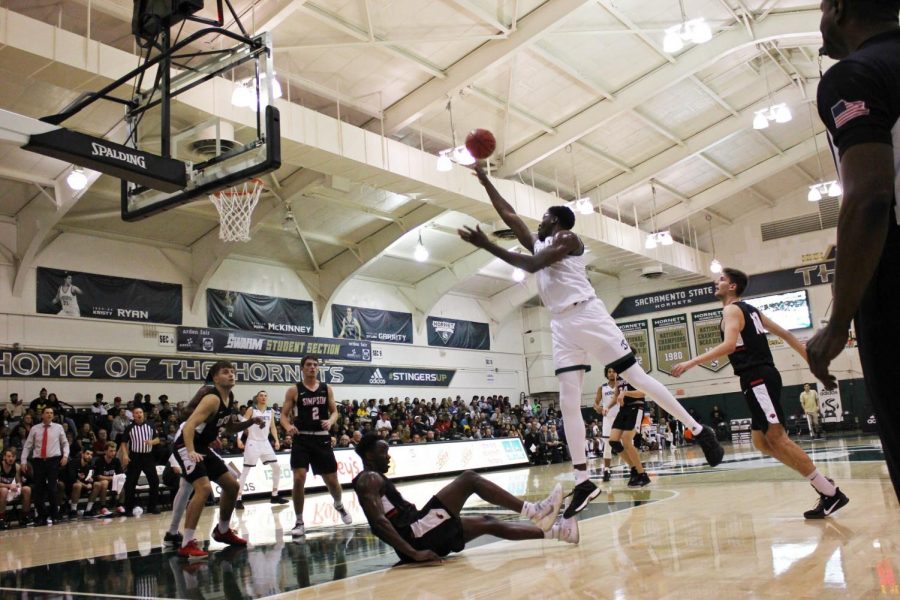 Sac State senior center Joshua Patton shoots the ball against Simpson on Friday, Nov. 8, at The Nest. Patton had a game-high 20 points on 9-11 from the field.