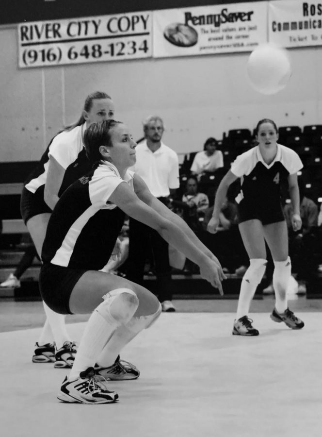 Assistant volleyball coach Sarah Chlebana digs the ball during a match in 2000. Chlenbana helped lead the Hornets to four consecutive Big Sky Championships and NCAA tournament appearances during her time as a student athlete.