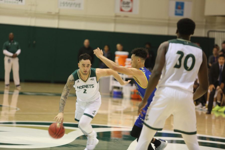 Sac State senior guard Izayah Mauriohooho-Leafa gets a screen from senior center Joshua Patton against UC Riverside on Friday, Nov. 15 at The Nest. Mauriohooho-Leafa had seven points and a game-high four steals in the win.