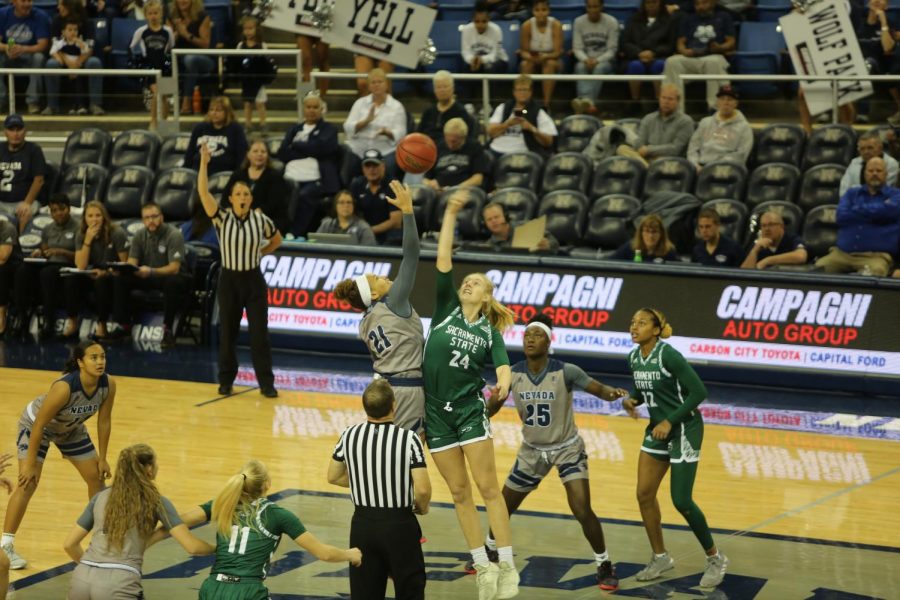 Sac State sophomore forward Tiana Johnson battles Nevada sophomore forward Imani Lacy for the opening tip on Saturday, Nov. 9 at Lawlor Events Center in Reno, Nevada. The Hornets led after the first half, but ultimately lost 83-72 to the Wolf Pack.