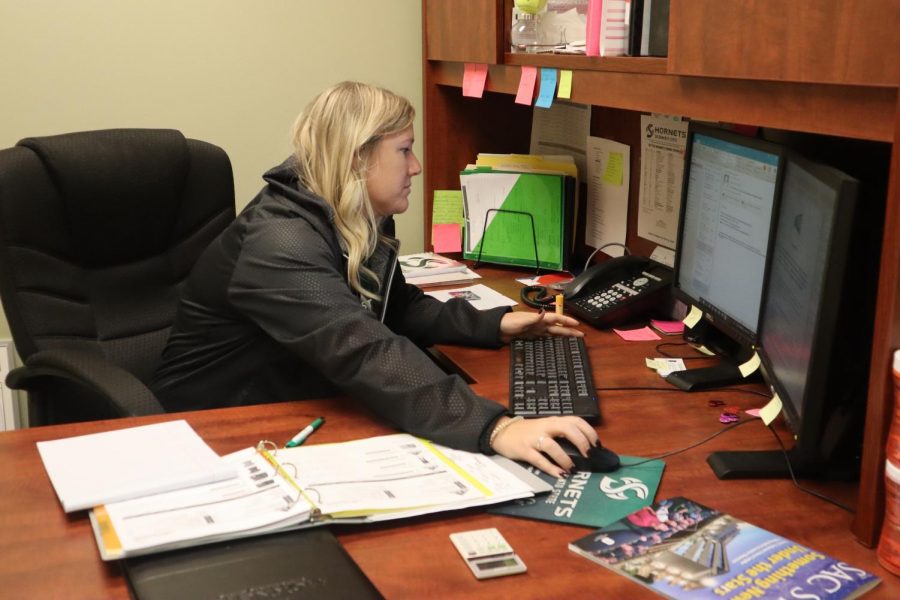 Sac State womens tennis coach Cami Hubbs works in her office at Yosemite Hall. Hubbs is entering her third year as head coach of the Hornets.