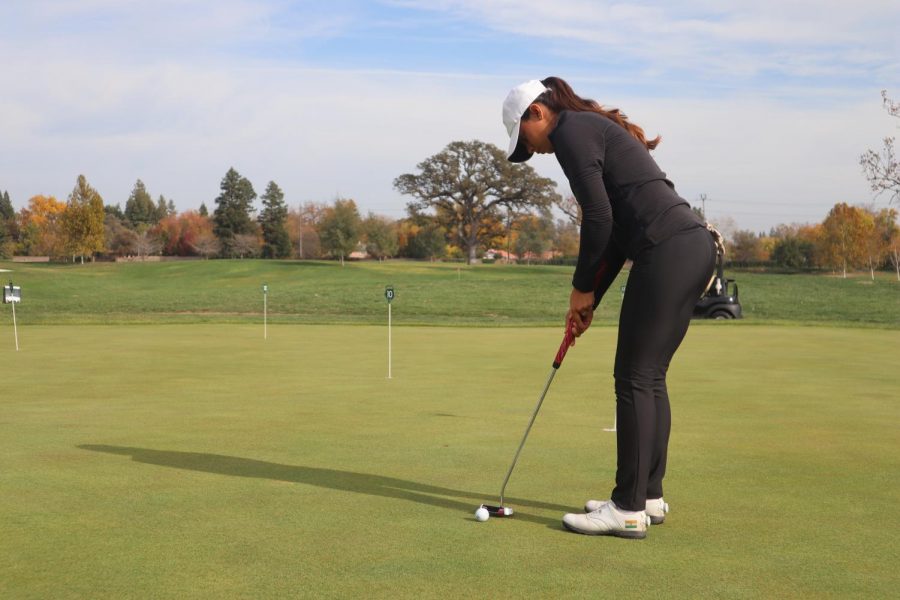 Sac+State+senior+golfer+Nishtha+Madan+practices+putting+at+Del+Paso+Country+Club+in+Sacramento%2C+California.+Shes+intent+to+improve+her+71.9+average.