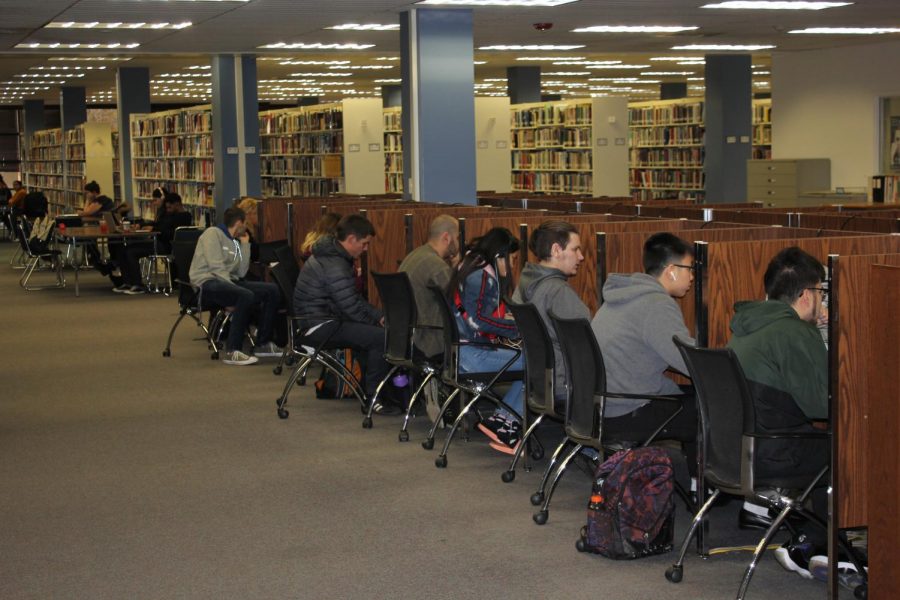Students studying the week before finals in the Sac State Library. Next year, students may no longer have access to the updated Elsevier scientific journal database as the CSU system is renegotiating their contract with the company due to the high cost. 