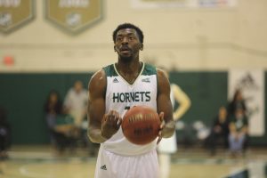 Sac State senior center Joshua Patton prepares to shoot a free throw against Cal Poly on Wednesday, Dec. 18 at the Nest. The Hornets defeated the Mustangs 57-56.