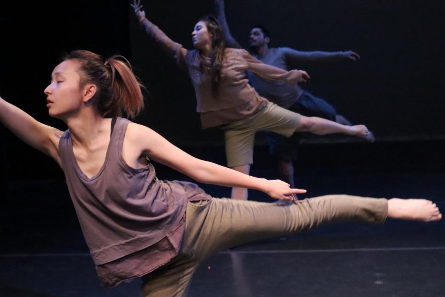 Sac+State+dancers+Joyce+Vang%2C+Juliane+Rose+Cooper+and+Louis+Moreno+rehearse+for+their+upcoming+shows.+Sac+States+University+Dance+Company+will+be+performing+at+Shasta+Hall+from+Dec.+5+to+Dec.+7.