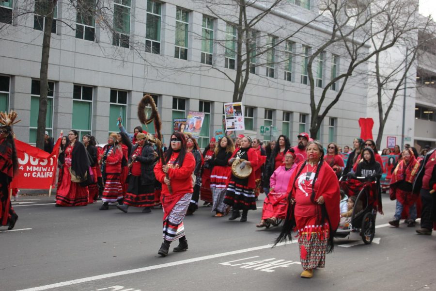 Members of the Miwok tribe guiding marchers to the state Capitol on Saturday morning at the Womens March Sacramento on January 18, 2020. Photo by Kendra L. Rivera.