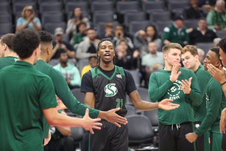 Sac State senior forward Osi Nwachukwu high-fives teammates during pregame introductions before playing UC Davis on Wednesday, Nov. 20, 2019 at the Golden 1 Center. The Hornets lost on the road to Southern Utah 74-49 on Saturday afternoon.