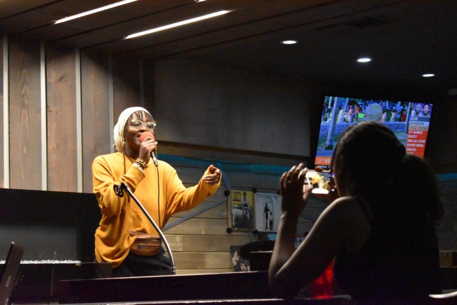 Rapper and Sac State senior communications major Greo the Storyteller performs her song Chillin Thursday, Jan. 30, at Stage 76 in Carmichael. She performed along with other Sacramento artists.