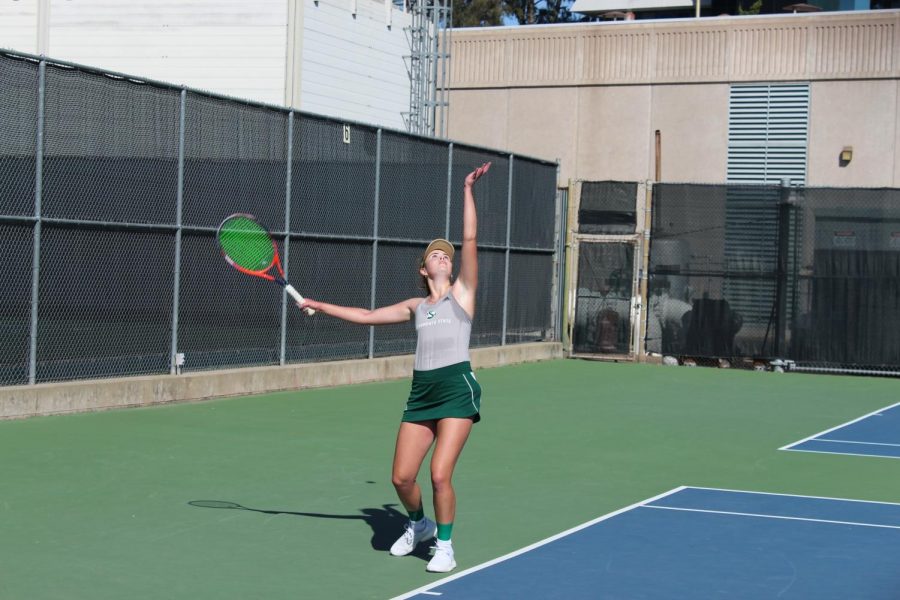 Sac State freshman Paige Alter prepares to serve in her singles match against Pacific on Sunday, Feb. 23 at the Sacramento State courts. The Hornets fell to the Tigers 6-1.